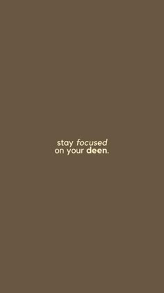 a brown wall with the words stay focused on your deen