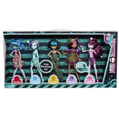 the monster girls doll set is in its box and has four different outfits on it