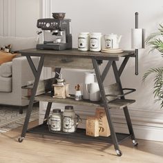 a coffee table with various items on it in a living room next to a couch