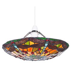 a stained glass hanging light fixture with dragonflies on it's side and red beads