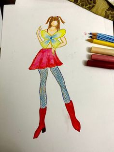 a drawing of a girl with a butterfly on her chest and red boots, standing next to colored crayons