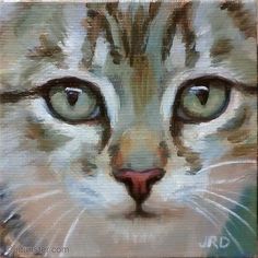 an oil painting of a cat's face with green eyes and whiskers