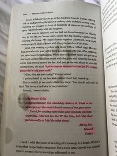 an open book with pink writing on the pages and some other words written in it