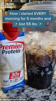 a cup of coffee next to a container of ice and a bag of protein drink