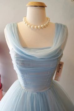 Fitted Vintage Tulle Dress, Fitted Vintage Tulle Skirt Dress, Vintage Fitted Tulle Dress, 1950s Style Sleeveless Wedding Dress, Vintage Tulle Dress For Party, Vintage Tulle Skirt Dress For Party, Light Blue Sleeveless Vintage Dress, Light Blue Vintage Party Dress, Vintage Light Blue Party Dress