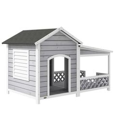 a dog house that is gray and white