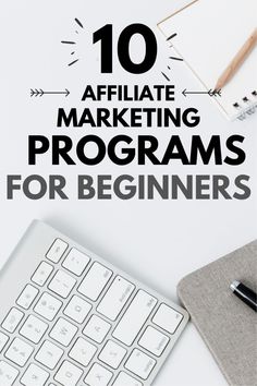 a keyboard, notebook and pen on top of a desk with the words 10 affiliate marketing programs for beginners