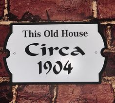 this old house sign is on the side of a brick wall that says,'circa '