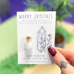 This delicate little glass jar of crystal chips makes a wonderful gift! Each of our crystals have been carefully chosen for the properties that they contain. The A7 display card is perfect for popping in the post! *Please note that products are unsuitable for children aged 8 and under and all children over this age should be supervised. If you would like to send this directly to the recipient we can pop it in a luxury gift bag, just make sure you add their address as the delivery adress when checking out.  If you'd like a handwritten note included too just add the wording in the 'notes' section at checkout. Due to the number of orders we receive it is not always possible to read the notes on each order until we come to process it.  If you need to contact us regarding your order then please Apothecary Candles, Candle Cards, Crystal Chips, Missing Someone, Paper News, Ruby Zoisite, White Moonstone, Letterbox Gifts, Worry Stones