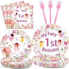 a pink fairy birthday party set with plates, forks and napkins