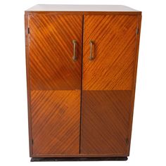 an old wooden cabinet with two doors