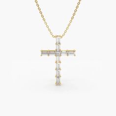 Baguette Diamond Cros Necklace  Details	Made to Order	Gold Kt: 14K Solid Gold	Available Gold Color: Rose Gold, Yellow Gold, White Gold	Cross Height & Width: 17.5x12MM	Baguette Diamond: 10 pcs 2.5 x 1.5MM	Princess-Cut Diamond: 1 pc 1.5MM	Number of Stones: 11	Stone Size: 1.5MM	Total CTW: 0.38	Diamond Color-Clarity: G Color VS ClarityPresent your faith... This handcrafte Necklace features a beautiful display of faith with ten baguette diamonds and one pricess cut diamond. Shipping Time 10-12 Working Days Layering Diamond Necklaces, Diamond Cross Necklace Gold, Diamond Cross Necklace, 11 Stone, Silver Necklace Set, Diamond Cross Necklaces, Gold Cross Necklace, Baguette Diamonds, Diamond Cross Pendants