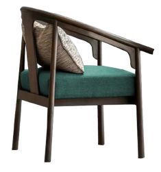 a wooden chair with a green cushion on it's back and armrests