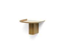 an oval shaped table with a gold finish on the top, against a white background