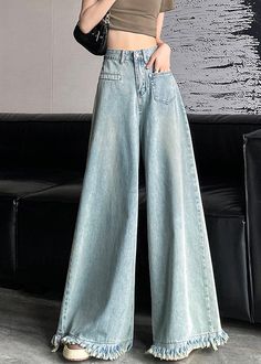 Light Blue Button Denim Wide Leg Pants TasseledFabric: Denim FabricSize Fit: This garment fits true to size.Length: Size L measures 40.56"from waist to hem.Waist:Fitted - very fitted at natural waist Hip: Loosely Fitted. room for hips. Hand Wash Cold. Denim Wide Leg Pants, Fur Sliders, Denim Wide Leg, Pantalon Large, Red Stripe, Boho Stil, Wide Leg Denim, Denim Fabric, Boho Outfits