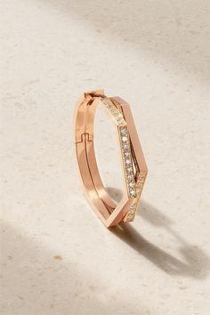 The angular lines of Repossi's 'Antifer' hoop earring are inspired by the steep cliffs of Normandy. It's made from 18-karat rose gold and dusted with 0.20-carats of pavé-set diamonds. Luxury Rose Gold Diamond Cut Hoop Earrings, Repossi Jewelry, Rose Diamond, Diamond Hoop Earrings, Rose Gold Jewelry, Single Earring, Rose Earrings, Rose Gold Diamonds, Fine Jewellery Earrings