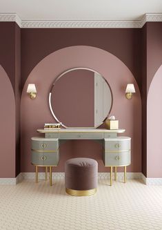 a dressing table and stool with a mirror on the wall in a room that has pink walls