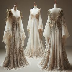 three wedding gowns on mannequins with flowers