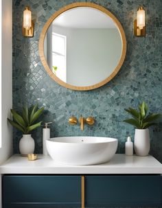 a bathroom sink with a round mirror above it and two potted plants on the counter