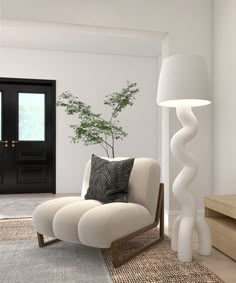 a living room with a chair, lamp and door