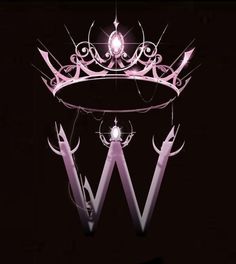 a pink light up letter w with a crown hanging from it's centerpiece