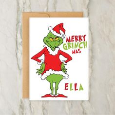 a christmas card with an image of the grinch wearing santa's helper hat