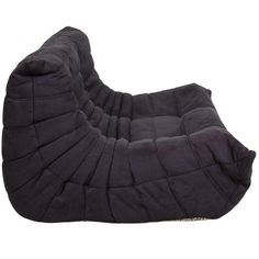 a black bean bag chair sitting on top of a white floor