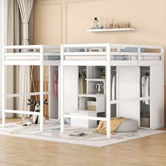 a white bunk bed sitting on top of a hard wood floor