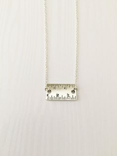 Beautiful Simplistic Ruler Necklace. This is a wonderful unique and awesome for anyone that works in math, carpentry, architecture or perhaps their loved one does! Carpenters, Architect, Handy Man, Handy Woman, Artists, Mathematicians ...This can also be a wonderful necklace for anyone who appreciates unique and different necklaces, and loves measurements! Elegant and simplistic yet creative and makes a wonderful statement. Includes: ●Ruler Pendant - Measurements are 12x22mm ●Pendant is Antique Math Gift, Handy Woman, Tool Gifts, Sewing Gifts, Ruler, Art Gift, Locket, Gold Necklace, Sewing