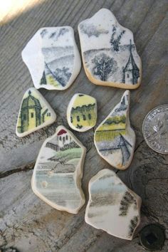 some cookies are sitting on a table next to a penny and a piece of paper