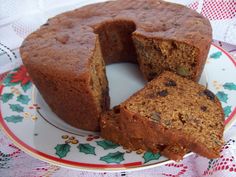 a cake on a plate with one slice cut out