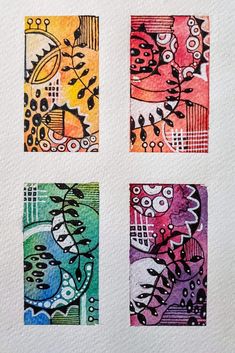 four square paintings with different designs on them