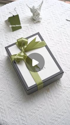 an open gift box sitting on top of a table