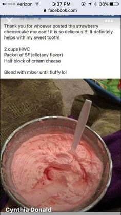 a bowl filled with ice cream sitting on top of a table