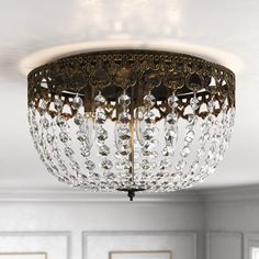 a chandelier hanging from the ceiling in a room