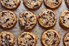 chocolate chip cookies on a baking sheet ready to be eaten