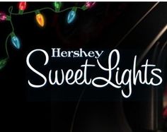 the words hershey sweet lights are lit up in front of a black background with christmas lights