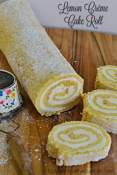 the lemon creme cake roll is cut in half