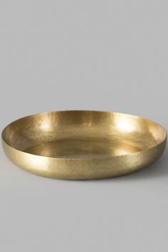 a gold plate sitting on top of a table