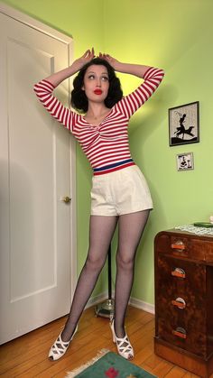 "For your consideration is this ultra cute pair of 1950s short shorts! Perfect staple for a 1940s or 1950s wardrobe. Red, white, and blue is such a classic combination. I bought these to wear roller skating but they're slightly too big for me and I haven't the heart to alter them :') These little cuties deserve to be *seen*! These white cotton shorts feature a red, white, and blue striped nylon band along the waist, and a metal zip up the back. The label is \"Lord and Taylor fifth avenue -- sports and country clothing\" as well another label that says a size \"14/36\" but do follow the measurements listed to find the best fit for you! The garment is in good used vintage condition with a few faint spots and marks throughout on the shorts and the band but mainly on the front right side. Ther 1950s Shorts Outfit, Retro Red Short Shorts, Vintage White Jean Shorts, Retro White Shorts For Spring, Retro White Short Bottoms, White Retro Shorts For Spring, Retro Red Shorts, Vintage High Waist White Shorts, Retro Fitted High-waisted Jean Shorts