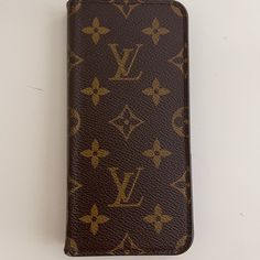 Authentic Louis Vuitton Folding Phone Case. Receipts / Tag Authentication Owned And Used By One Person, Myself Purchased In Portland Oregon Store. Very Small, Normal Wear To The Back Edge Where Is Folds. I Never Would Fold Around The Cover To The Back Saving The Edges. I Adore This Cover. It’s Not Made Any Longer. I Upgraded To Iphone 12 And This Will Not Fit Or I Would Not Be Selling. Hope Someone Finds A Good Home For Her. She Is Beautiful In Person And Protective. Get Lots Of Compliments Cover Louis Vuitton, Louis Vuitton Accessories, Louis Vuitton Brown, Portland Oregon, Authentic Louis Vuitton, Iphone X, Portland, Iphone 12, Oregon