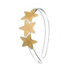 Shine bright this holiday season with our Stars Glitter Gold Headband! Adorned with sparkling gold stars, this enchanting headband is perfect for adding a touch of celestial magic to any outfit. Whether for festive parties, holiday photos, or everyday glamour, this headband brings both elegance and fun to your little one’s look! Stars Glitter, Celestial Magic, Ros Gold, Gold Glitter Stars, Unicorns And Mermaids, Star Headband, Copper Pearl, Gold Headband, Glitter Gold