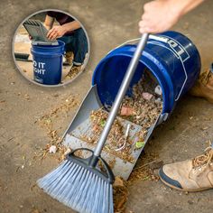 a person is cleaning the ground with a blue bucket and a broom while another person sits in brown boots