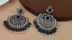 Dark Blue Pearl Kundan Earrings Indian Blue Earrings Pakistani Earrings Indian Jewelry Bridal Jewelry Blue Punjabi Meenakari Earrings Making Time 10-15 Days In Personal trust me this is so much beautiful and in great quality, video call also available too see our products. These Celebrity Inspired Jhumka Earrings Are A Perfect Accessory This Wedding Season. Secured with a post and back Handcrafted To Perfection Perfect For Indian Weddings And Celebrations A Beautiful & Memorable Gift for Weddings and Special Occasions Fashion Empire Studio gives you new look, Made of high quality material(s).  This is very Designer Long Jhumki , Its A Choice Of Many Bollywood Celebrities.  Trust me, it is more Beautiful in Real another the Picture  This beautiful Set which is light in weight. The stones us Festive Blue Drop Earrings, Handmade Blue Danglers For Wedding, Traditional Blue Danglers For Pierced Ears, Traditional Blue Danglers, Blue Festive Danglers, Silver Meenakari Drop Pearl Earrings, Heavy Blue Earrings For Festive Occasions, Blue Earrings For Festivals Gift, Blue Round Chandelier Earrings For Wedding