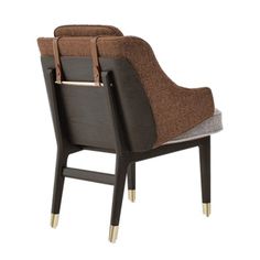 the back of a chair with a wooden frame and fabric seat pad on it's arm