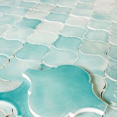 a blue and white tile pattern on the floor