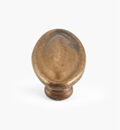 an antique brass door knob on a white background