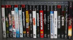 a bunch of video games are on a shelf