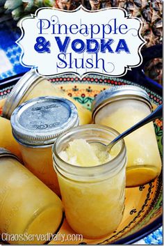 pineapple and vodka slush in jars on a plate