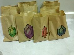 four bags with different colored diamonds on them